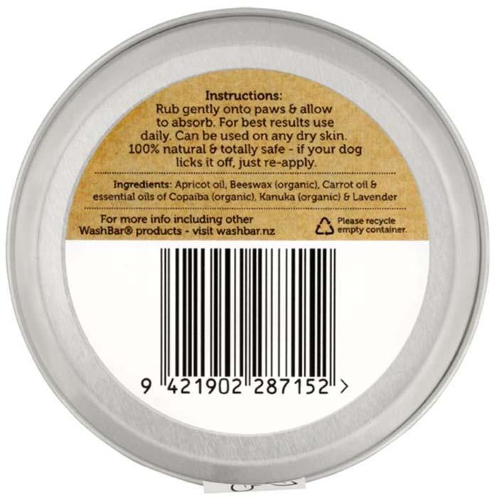 Back of WashBar Paw Balm tin showing ingredients and barcode – organic Apricot, Carrot, Kanuka, Lavender, Copaiba oils.