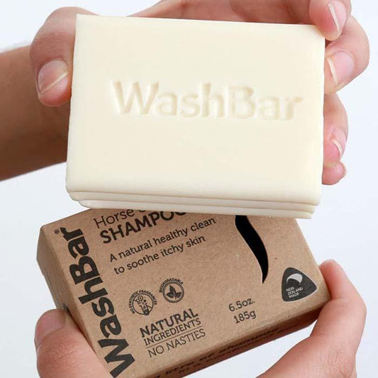 Washbar Horse & Hound solid shampoo bar and box held in a persons hands – eco-friendly grooming soap for dogs and horses, gentle & vegan-certified